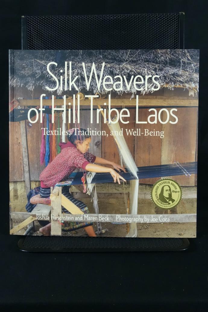 "Silk Weavers of Hill Tribe Laos: Textiles, Tradition, and Well-Being"  (Book) autographed